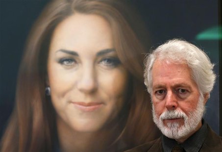 Glasgow-born artist Paul Emsley poses next to hisoil painting of Britain's Catherine, Duchess of Cambridge, the first commisioned portrait o Glasgow-born artist Paul Emsley poses next to hisoil painting of Britain's Catherine, Duchess of Cambridge, the first commisioned portrait o