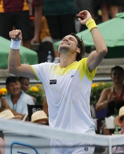 Spain's David Ferrer celebrates beating Germany's Philipp Kohlschreiber during their men's singles final match at the Heineken Open in Auckl Spain's David Ferrer celebrates beating Germany's Philipp Kohlschreiber during their men's singles final match at the Heineken Open in Auckl
