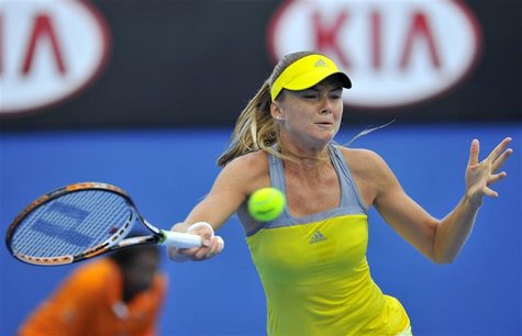 Daniela Hantuchova of Slovakia hits a return to Maria Sharapova of Russia during an exhibition match at the Australian Open tennis tournamen Daniela Hantuchova of Slovakia hits a return to Maria Sharapova of Russia during an exhibition match at the Australian Open tennis tournamen