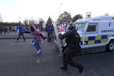 Loyalists demonstrators clash with police during rioting in East Belfast, January 12, 2013. REUTERS/Cathal McNaughton Loyalists demonstrators clash with police during rioting in East Belfast, January 12, 2013. REUTERS/Cathal McNaughton