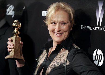 Actress Meryl Streep shows off her Golden Globe award for the best performance by an actress in a motion picture - drama for her work in " T Actress Meryl Streep shows off her Golden Globe award for the best performance by an actress in a motion picture - drama for her work in " T
