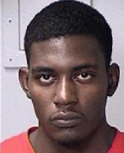 John Aguilar is the younger of the two suspects. John Aguilar is the younger of the two suspects.