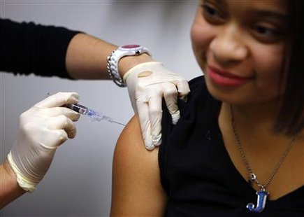 Jasmine Rodriguez, 10, gets an influenza vaccine at Boston Children's Hospital in Boston, Massachusetts January 10, 2013.
Credit: Reuters/Brian Snyder Jasmine Rodriguez, 10, gets an influenza vaccine at Boston Children's Hospital in Boston, Massachusetts January 10, 2013.
Credit: Reuters/Brian Snyder
