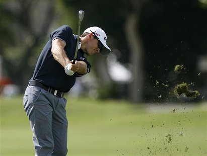 Scott Langley of the U.S. hits a fairway shot on the second hole during the third round of the Sony Open golf tournament in Honolulu, Hawaii Scott Langley of the U.S. hits a fairway shot on the second hole during the third round of the Sony Open golf tournament in Honolulu, Hawaii