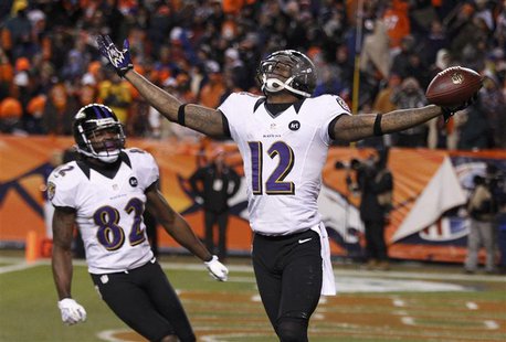 Baltimore Ravens wide receiver Jacoby Jones (R) celebrates his fourth quarter touchdown against the Denver Broncos with teammate Torrey Smit Baltimore Ravens wide receiver Jacoby Jones (R) celebrates his fourth quarter touchdown against the Denver Broncos with teammate Torrey Smit