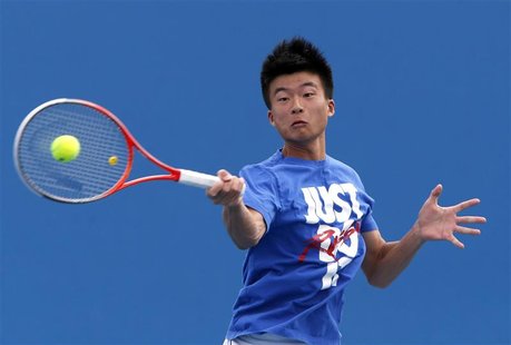 Wu Di of China serves during a practice session at the Australian Open tennis tournament in Melbourne, January 13, 2013. REUTERS/David Gray Wu Di of China serves during a practice session at the Australian Open tennis tournament in Melbourne, January 13, 2013. REUTERS/David Gray