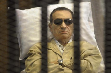 Former Egyptian President Hosni Mubarak sits inside a cage in a courtroom in Cairo June 2, 2012. REUTERS/Stringer Former Egyptian President Hosni Mubarak sits inside a cage in a courtroom in Cairo June 2, 2012. REUTERS/Stringer