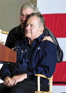 Former U.S. Presidents George W. Bush and his father George H.W. Bush attend a function onboard the USS George H.W. Bush aircraft carrier of Former U.S. Presidents George W. Bush and his father George H.W. Bush attend a function onboard the USS George H.W. Bush aircraft carrier of