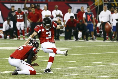 Atlanta Falcons kicker Matt Bryant (R) kicks the winning field goal with holder Matt Bosher to defeat the Seattle Seahawks in their NFL NFC Atlanta Falcons kicker Matt Bryant (R) kicks the winning field goal with holder Matt Bosher to defeat the Seattle Seahawks in their NFL NFC