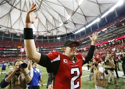 Atlanta Falcons quarterback Matt Ryan celebrates after the Falcons defeated the Seattle Seahawks in their NFL NFC Divisional playoff footbal Atlanta Falcons quarterback Matt Ryan celebrates after the Falcons defeated the Seattle Seahawks in their NFL NFC Divisional playoff footbal