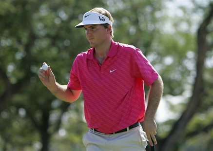 Russell Henley of the U.S. waves to the gallery after putting on the fourth green during the final round of the Sony Open golf tournament in Russell Henley of the U.S. waves to the gallery after putting on the fourth green during the final round of the Sony Open golf tournament in