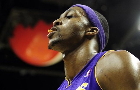 Los Angeles Lakers Dwight Howard leaves the court after being ejected for a flagrant foul on Denver Nuggets Kenneth Faried during their NBA Los Angeles Lakers Dwight Howard leaves the court after being ejected for a flagrant foul on Denver Nuggets Kenneth Faried during their NBA