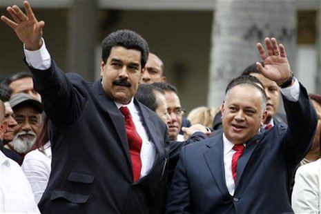 Venezuelan Vice President Nicolas Maduro (L) arrives with National Assembly President Diosdado Cabello during the assembly inauguration in C Venezuelan Vice President Nicolas Maduro (L) arrives with National Assembly President Diosdado Cabello during the assembly inauguration in C