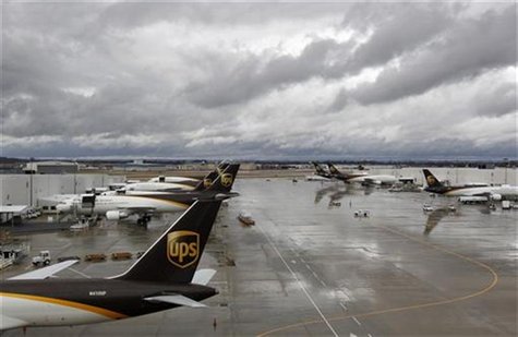 United Parcel Service aircrafts are being loaded with air containers full of packages bound for their final destination at the UPS Worldport United Parcel Service aircrafts are being loaded with air containers full of packages bound for their final destination at the UPS Worldport