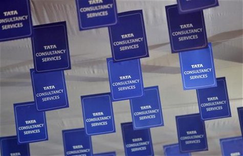 Logos of Tata Consultancy Services (TCS) are displayed at the venue of the annual general meeting of the software services provider in Mumba Logos of Tata Consultancy Services (TCS) are displayed at the venue of the annual general meeting of the software services provider in Mumba
