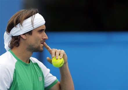 David Ferrer of Spain arrives for a practice session at the Australian Open tennis tournament in Melbourne January 13, 2013. REUTERS/Damir S David Ferrer of Spain arrives for a practice session at the Australian Open tennis tournament in Melbourne January 13, 2013. REUTERS/Damir S