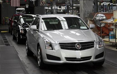 A 2013 ATS Cadillac luxury vehicle waits to roll of the final line at the Lansing Grand River Assembly Plant in Lansing, Michigan July 26, 2 A 2013 ATS Cadillac luxury vehicle waits to roll of the final line at the Lansing Grand River Assembly Plant in Lansing, Michigan July 26, 2