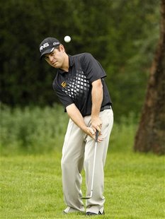 Louis Oosthuizen of South Africa plays a shot on the 7th hole during the final of the 2012 Nedbank Golf Challenge in Sun City, December 2, 2 Louis Oosthuizen of South Africa plays a shot on the 7th hole during the final of the 2012 Nedbank Golf Challenge in Sun City, December 2, 2