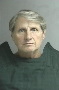 Peregrine Financial Group's former Chief Executive Russell Wasendorf Sr. wears an anti-suicide tunic following his arrest on charges of lyin Peregrine Financial Group's former Chief Executive Russell Wasendorf Sr. wears an anti-suicide tunic following his arrest on charges of lyin