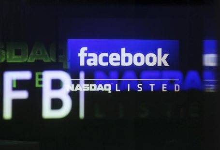 The Facebook logo is seen on a screen inside at the Nasdaq Marketsite in New York May 18, 2012. REUTERS/Shannon Stapleton The Facebook logo is seen on a screen inside at the Nasdaq Marketsite in New York May 18, 2012. REUTERS/Shannon Stapleton