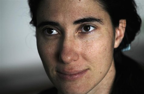 Cuban dissident blogger Yoani Sanchez listens to a question during an interview with Reuters at her home in Havana, in this February 9, 2011 Cuban dissident blogger Yoani Sanchez listens to a question during an interview with Reuters at her home in Havana, in this February 9, 2011