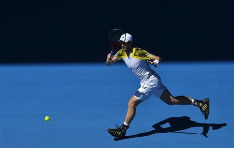 Andy Murray of Britain hits a return to Robin Haase of Netherlands during their men's singles match at the Australian Open tennis tournament Andy Murray of Britain hits a return to Robin Haase of Netherlands during their men's singles match at the Australian Open tennis tournament