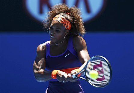 Serena Williams of the U.S. hits a return to Edina Gallovits-Hall of Romania during their women's singles match at the Australian Open tenni Serena Williams of the U.S. hits a return to Edina Gallovits-Hall of Romania during their women's singles match at the Australian Open tenni
