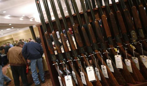A row of shotguns are seen during the East Coast Fine Arms Show in Stamford, Connecticut, January 5, 2013. REUTERS/Carlo Allegri A row of shotguns are seen during the East Coast Fine Arms Show in Stamford, Connecticut, January 5, 2013. REUTERS/Carlo Allegri