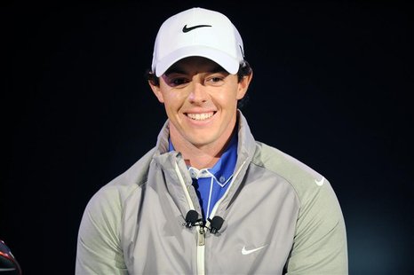 Rory McIlroy of Northern Ireland smiles during a presentation unveiling him as Nike's new ambassador in Abu Dhabi January 14, 2013. World go Rory McIlroy of Northern Ireland smiles during a presentation unveiling him as Nike's new ambassador in Abu Dhabi January 14, 2013. World go