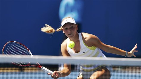 Donna Vekic of Croatia hits a return to Andrea Hlavackova of Czech Republic during their women's singles match at the Australian Open tennis Donna Vekic of Croatia hits a return to Andrea Hlavackova of Czech Republic during their women's singles match at the Australian Open tennis
