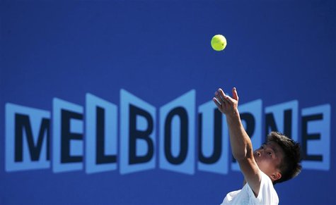 Wu Di of China serves to Ivan Dodig of Croatia during their men's singles match at the Australian Open tennis tournament in Melbourne Januar Wu Di of China serves to Ivan Dodig of Croatia during their men's singles match at the Australian Open tennis tournament in Melbourne Januar
