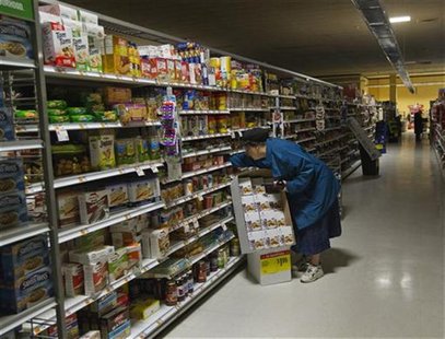 A woman looks for supplies at a Waldbaums grocery store in Long Beach, New York November 2, 2012. REUTERS/Shannon Stapleton A woman looks for supplies at a Waldbaums grocery store in Long Beach, New York November 2, 2012. REUTERS/Shannon Stapleton
