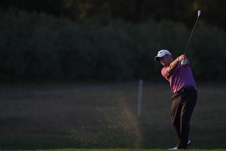 Paul McGinley of Ireland hits a shot on the 18th hole during the first round of the Portugal Masters golf tournament in Vilamoura October 14 Paul McGinley of Ireland hits a shot on the 18th hole during the first round of the Portugal Masters golf tournament in Vilamoura October 14