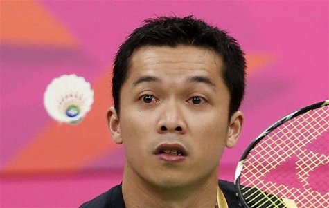 Indonesia's Taufik Hidayat plays against China's Lin Dan during their men's singles round of 16 badminton match during the London 2012 Olymp Indonesia's Taufik Hidayat plays against China's Lin Dan during their men's singles round of 16 badminton match during the London 2012 Olymp