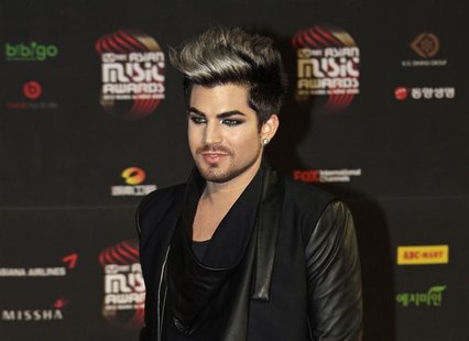 U.S. singer Adam Lambert poses on the red carpet as he attends the Mnet Asian Music Awards (MAMA) in Hong Kong November 30, 2012. REUTERS/Bo U.S. singer Adam Lambert poses on the red carpet as he attends the Mnet Asian Music Awards (MAMA) in Hong Kong November 30, 2012. REUTERS/Bo