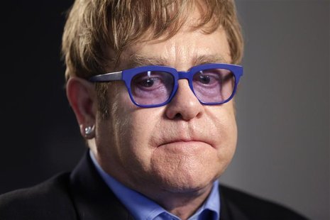 Musician Elton John pauses during an interview in Washington July 23, 2012. REUTERS/Kevin Lamarque Musician Elton John pauses during an interview in Washington July 23, 2012. REUTERS/Kevin Lamarque