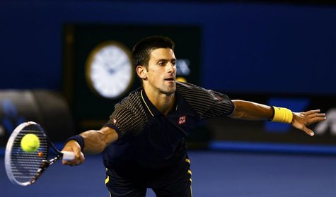 Novak Djokovic of Serbia hits a return to Ryan Harrison of the U.S. during their men's singles match at the Australian Open tennis tournamen Novak Djokovic of Serbia hits a return to Ryan Harrison of the U.S. during their men's singles match at the Australian Open tennis tournamen