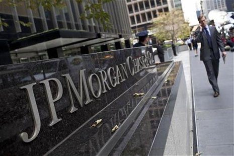 A man walks past JPMorgan Chase & Co's international headquarters on Park Avenue in New York July 13, 2012. REUTERS/Andrew Burton A man walks past JPMorgan Chase & Co's international headquarters on Park Avenue in New York July 13, 2012. REUTERS/Andrew Burton
