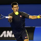 Novak Djokovic of Serbia hits a return to Ryan Harrison of the U.S. during their men's singles match at the Australian Open tennis tournamen Novak Djokovic of Serbia hits a return to Ryan Harrison of the U.S. during their men's singles match at the Australian Open tennis tournamen