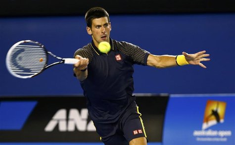 Novak Djokovic of Serbia hits a return to Ryan Harrison of the U.S. during their men's singles match at the Australian Open tennis tournamen Novak Djokovic of Serbia hits a return to Ryan Harrison of the U.S. during their men's singles match at the Australian Open tennis tournamen