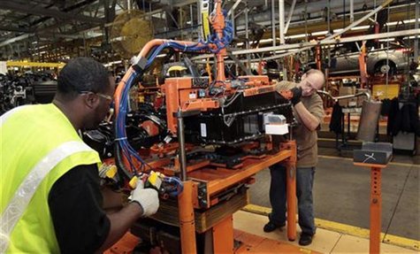 Ford Assembly workers install a battery onto the chassis of a Ford Focus Electric vehicle at the Michigan Assembly Plant in Wayne, Michigan Ford Assembly workers install a battery onto the chassis of a Ford Focus Electric vehicle at the Michigan Assembly Plant in Wayne, Michigan