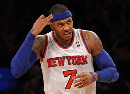 New York Knicks forward Carmelo Anthony reacts after hitting a three-point shot against the New Orleans Hornets in the second quarter of the New York Knicks forward Carmelo Anthony reacts after hitting a three-point shot against the New Orleans Hornets in the second quarter of the