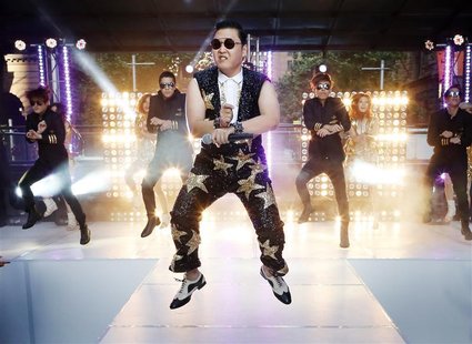South Korean singer Psy performs his hit "Gangnam Style" during a morning television appearance in central Sydney October 17, 2012. REUTERS/ South Korean singer Psy performs his hit "Gangnam Style" during a morning television appearance in central Sydney October 17, 2012. REUTERS/
