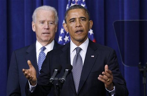 U.S. President Barack Obama (R) and Vice President Joe Biden announce a series of proposals to counter gun violence during an event at the W U.S. President Barack Obama (R) and Vice President Joe Biden announce a series of proposals to counter gun violence during an event at the W