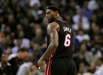 Miami Heat LeBron James looks on during the second half of their NBA basketball game against the Golden State Warriors in Oakland, Californi Miami Heat LeBron James looks on during the second half of their NBA basketball game against the Golden State Warriors in Oakland, Californi
