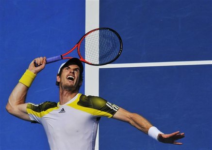 Andy Murray of Britain serves to Joao Sousa of Portugal during their men's singles match at the Australian Open tennis tournament in Melbour Andy Murray of Britain serves to Joao Sousa of Portugal during their men's singles match at the Australian Open tennis tournament in Melbour