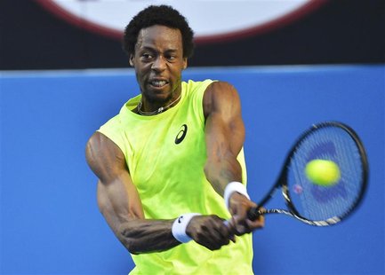 Gael Monfils of France hits a return to Lu Yen-Hsun of Taiwan during their men's singles match at the Australian Open tennis tournament in M Gael Monfils of France hits a return to Lu Yen-Hsun of Taiwan during their men's singles match at the Australian Open tennis tournament in M