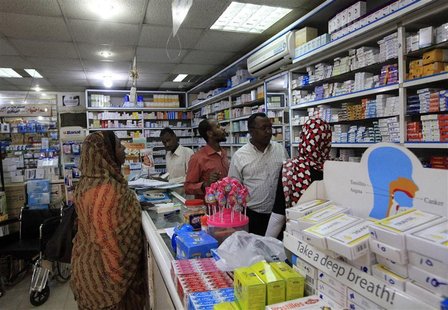 A customer buys medication at a pharmacy in Khartoum January 13, 2013. REUTERS/Mohamed Nureldin Abdallah A customer buys medication at a pharmacy in Khartoum January 13, 2013. REUTERS/Mohamed Nureldin Abdallah