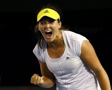Laura Robson of Britain celebrates defeating Petra Kvitova of Czech Republic in her women's singles match at the Australian Open tennis tour Laura Robson of Britain celebrates defeating Petra Kvitova of Czech Republic in her women's singles match at the Australian Open tennis tour