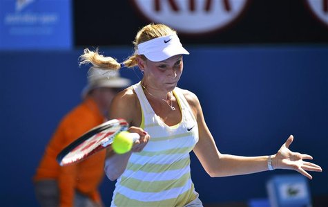 Donna Vekic of Croatia hits a return to Caroline Wozniacki of Denmark during their women's singles match at the Australian Open tennis tourn Donna Vekic of Croatia hits a return to Caroline Wozniacki of Denmark during their women's singles match at the Australian Open tennis tourn